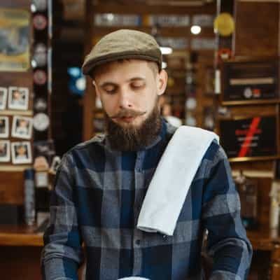 barber-and-customer-with-towel-on-face-barbershop-2023-11-27-05-19-43-utc-2.jpg